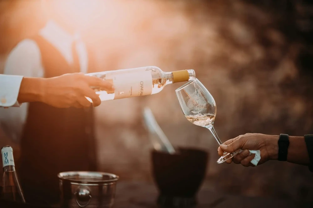 Pouring glass of wine